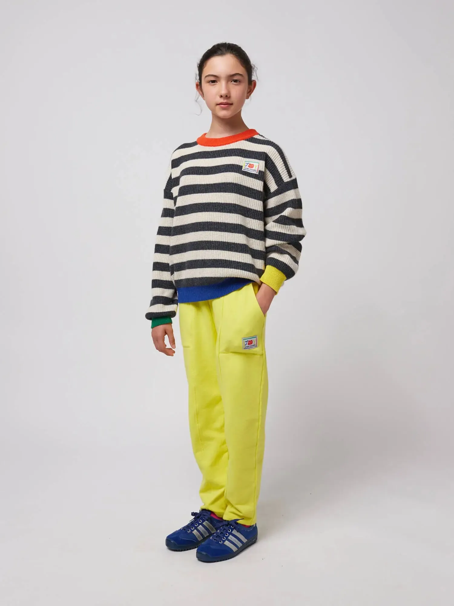 Smiling yellow jogging pants