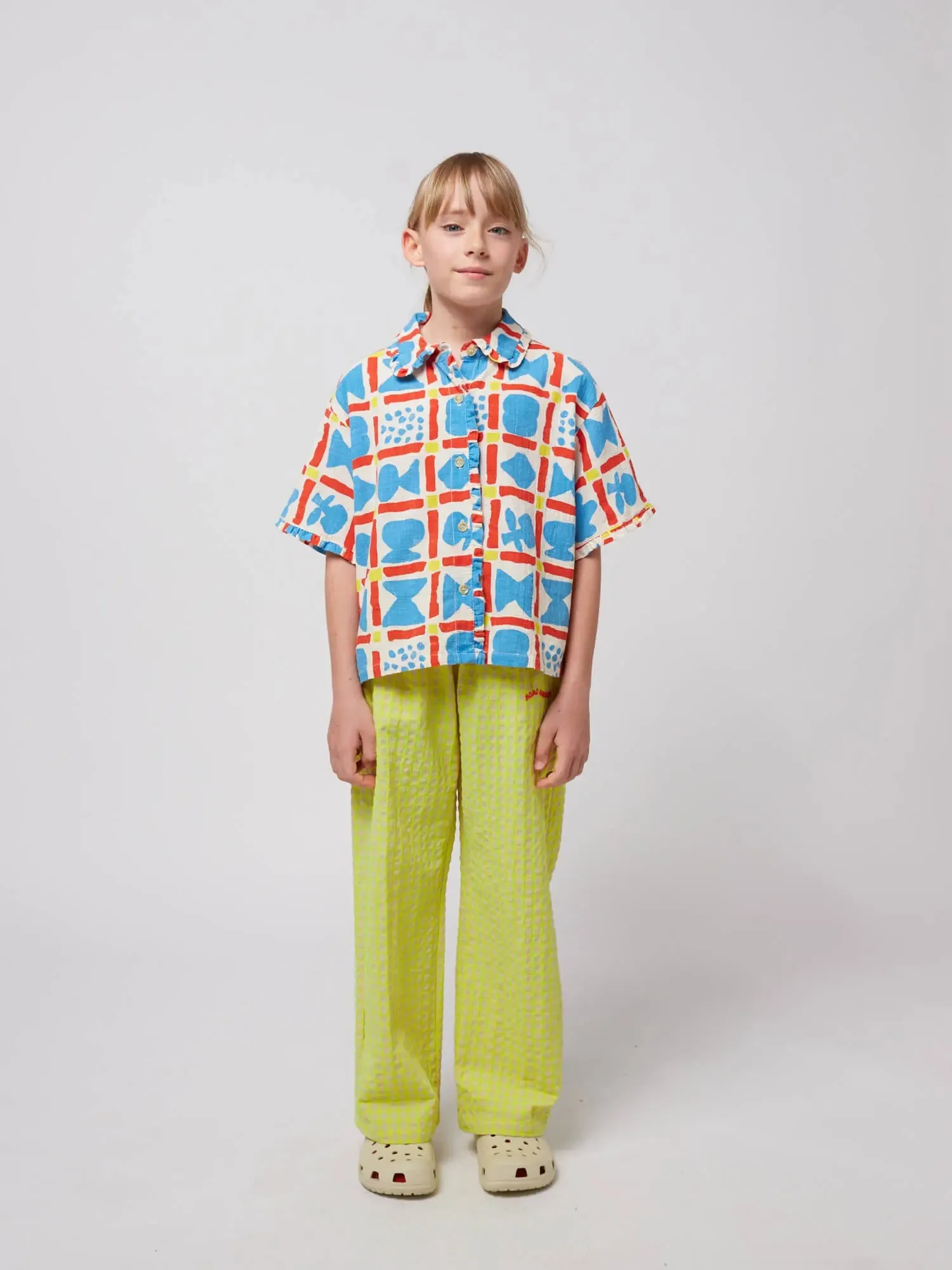 Smiling yellow jogging pants